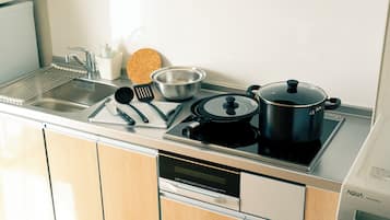 Family Condo, City View | Private kitchen | Full-size fridge, microwave, stovetop, electric kettle