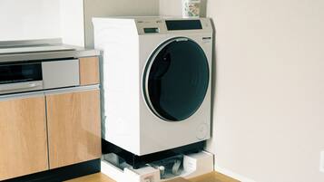 Condo família, vista para a cidade | Lavanderia