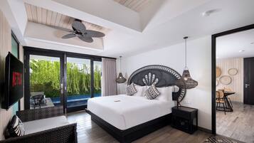 Suite, Pool View | In-room safe, desk, iron/ironing board, free WiFi