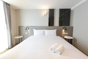 Suite, 1 Tempat Tidur King | Meja kerja, setrika/meja setrika, Wi-Fi gratis, dan seprai linen