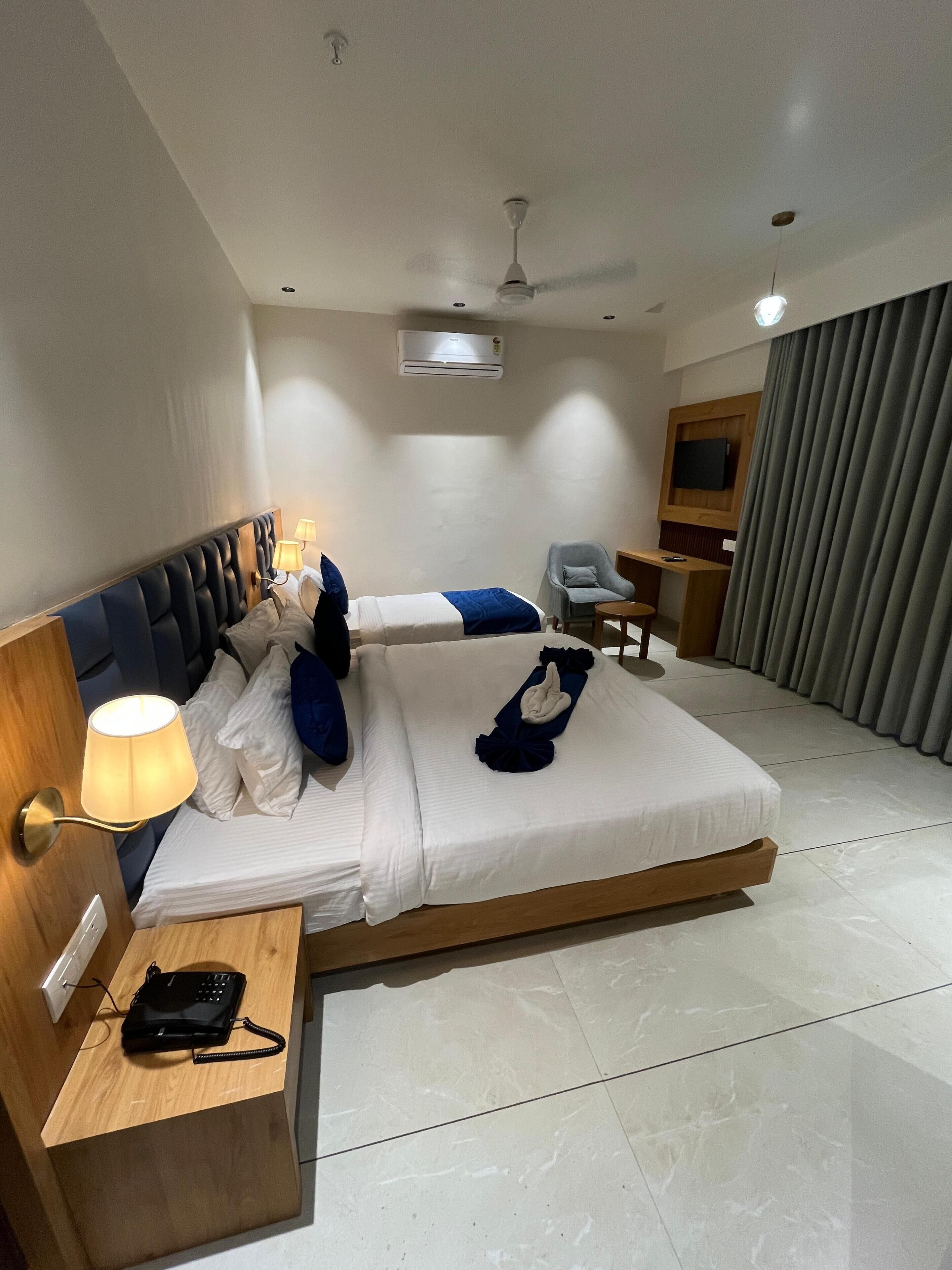 Family Triple Room | Premium bedding, minibar, desk, laptop workspace