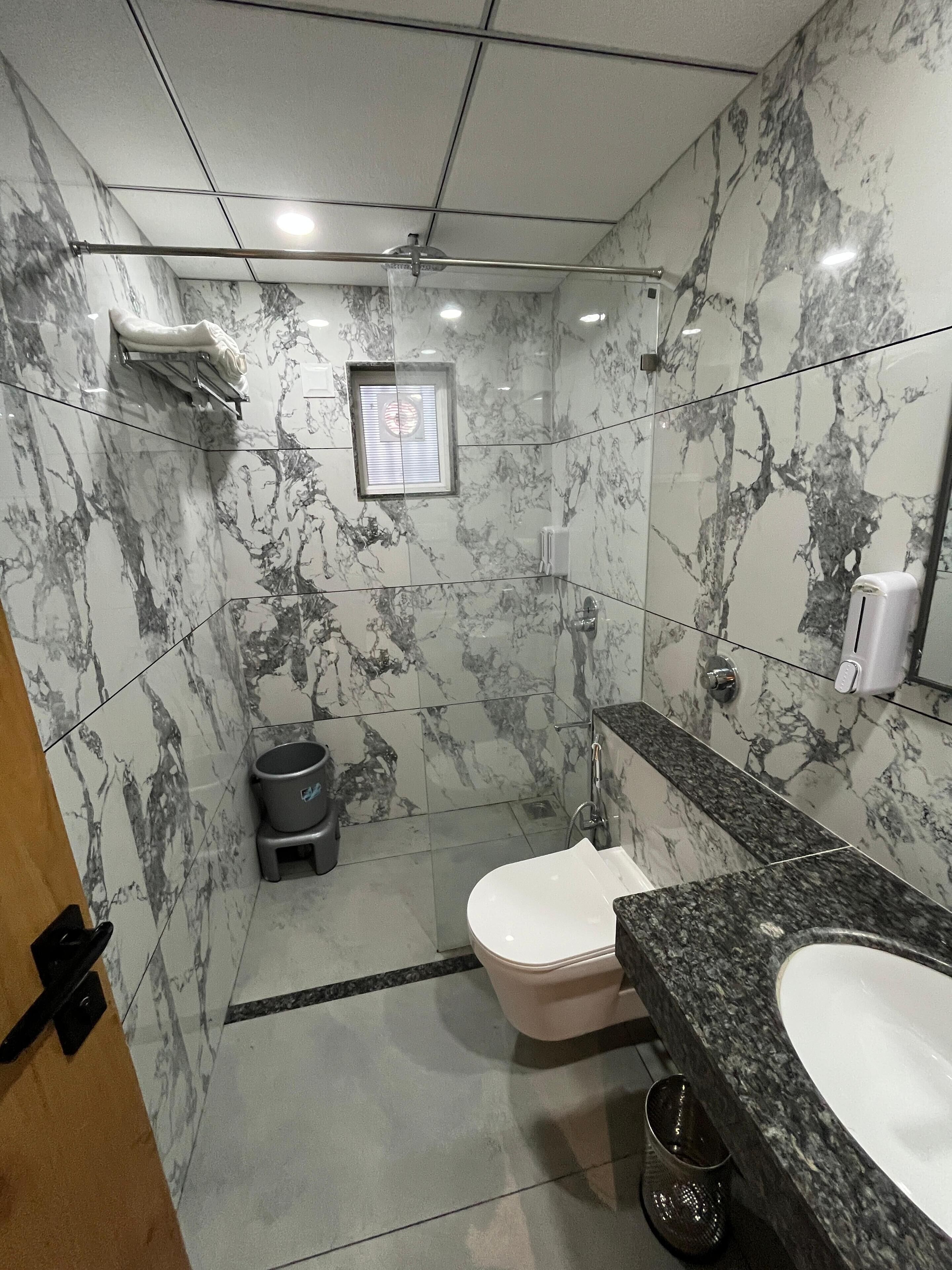 Shower, towels, soap, shampoo