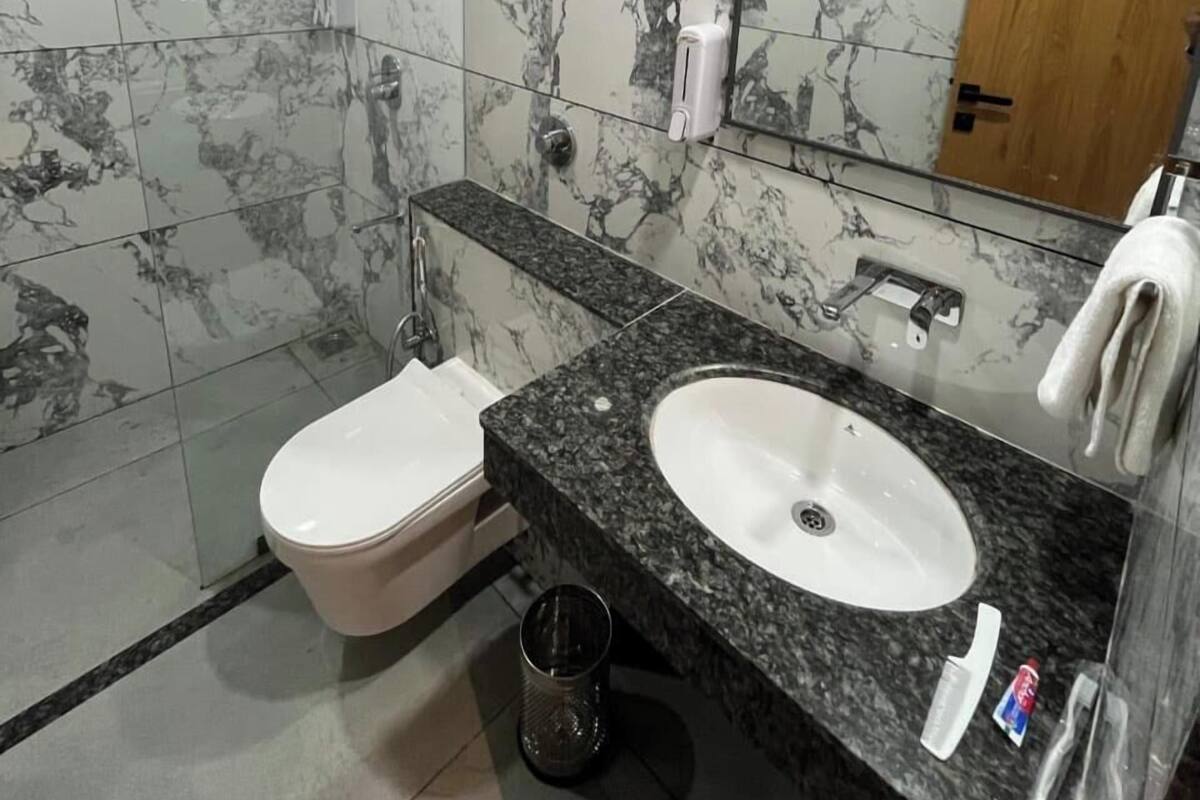Ducha, toallas, jabón y champú