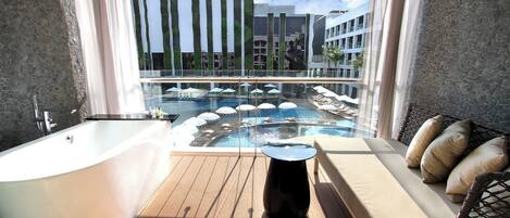 Deluxe Room, 1 King Bed, Balcony, Pool View | Balcony view