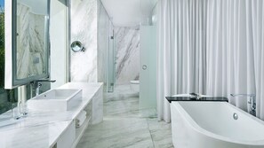 Junior Suite, 1 King Bed, City View | Bathroom | Free toiletries, hair dryer, bathrobes, slippers