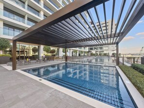 Outdoor pool - 1BR Skyline Views Dubai Creek Harbour (Dubai)