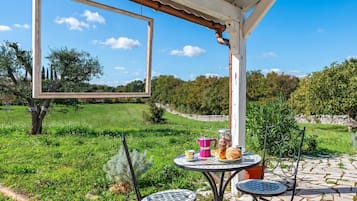 Family Villa, 1 Bedroom, Fireplace (Trullo ConoSolo With Pool) | Outdoor dining