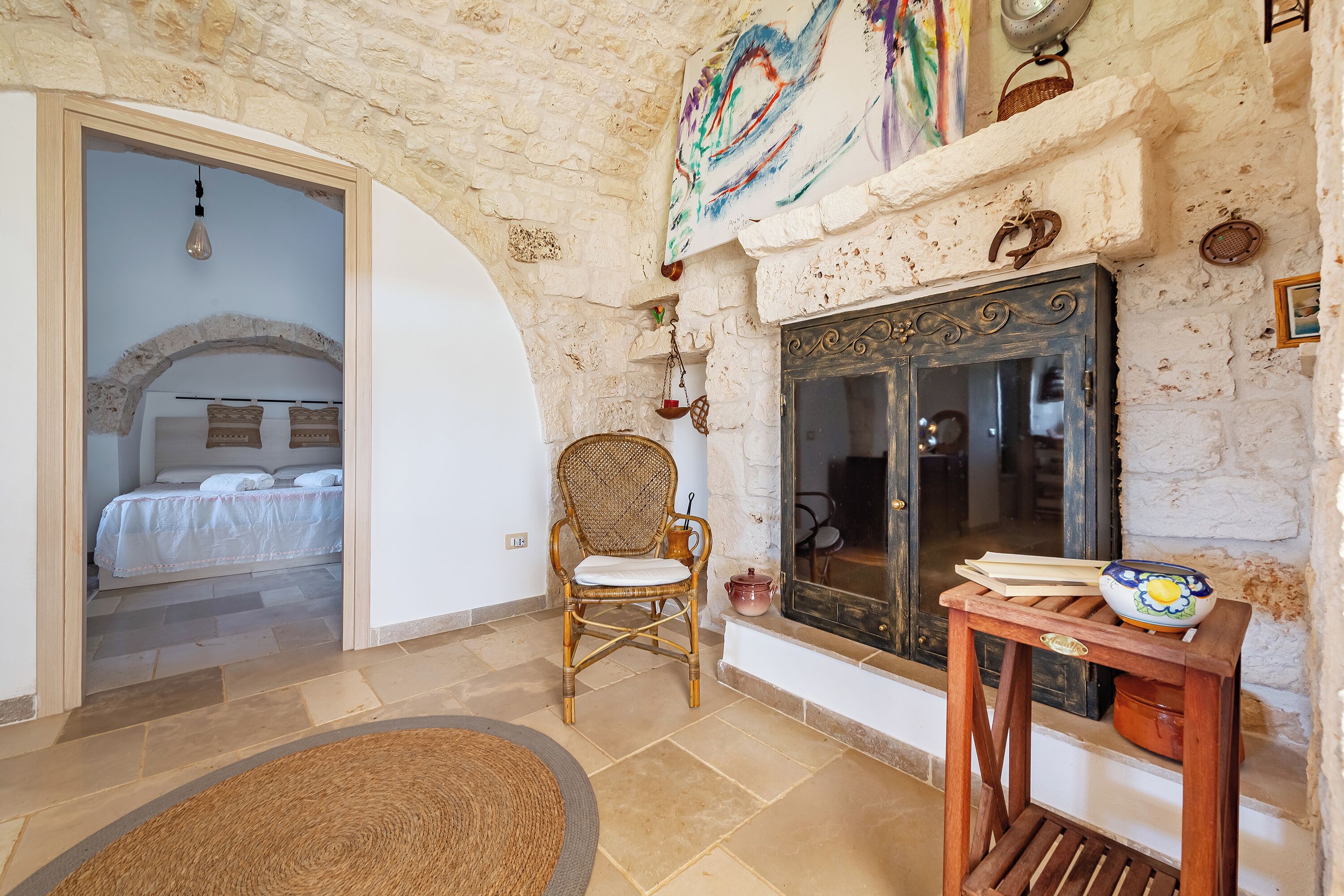Family Villa, Multiple Bedrooms (Trullo ConoSolo With Pool) | Living area | 21-inch Smart TV with digital channels, fireplace