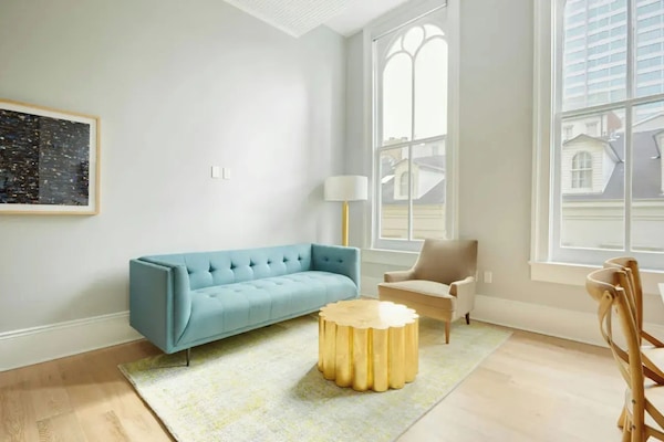 Bright and airy living room with a plush sofa.