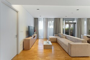 Luxury Apartment, Balcony, Sea View | Living area | 55-inch Smart TV with digital channels, Netflix, streaming services