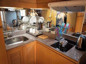 Fridge, microwave, coffee/tea maker, toaster