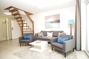 TV, fireplace - Beachfront apartment with balcony, use of swimming pool and sauna - Rex Rugia H-1010 - (Mönchgut)