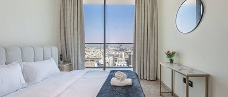 Een strijkplank/strijkijzer, internet, beddengoed