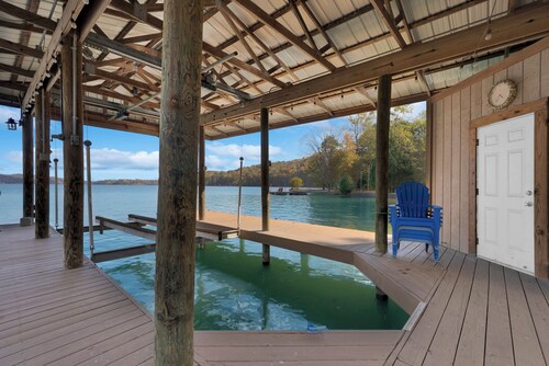 Flat access - covered boat slip with dock-two car garage - year round water