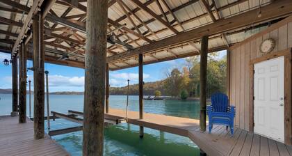 Flat access - covered boat slip with dock-two car garage - year round water
