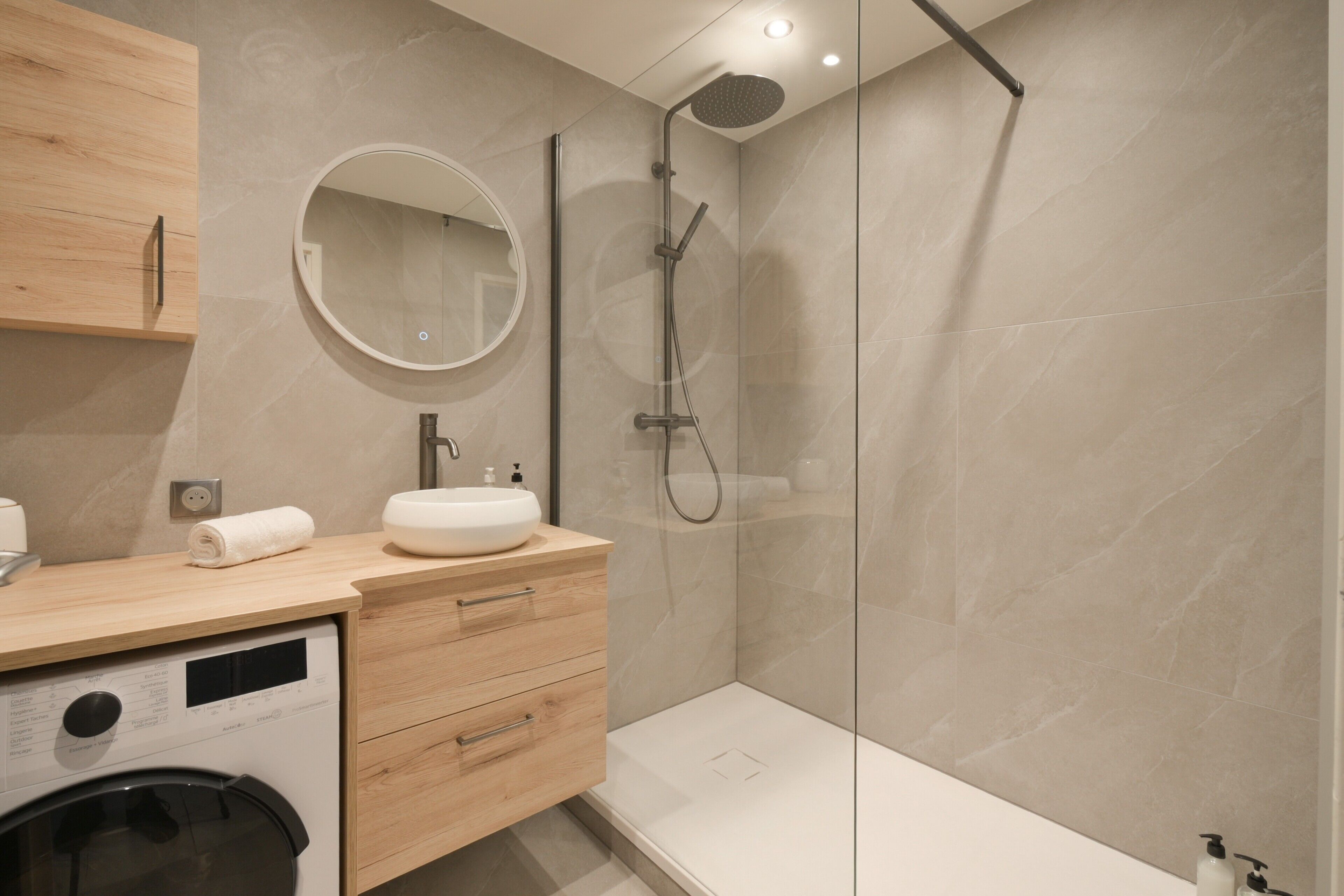 Shower, hair dryer, towels