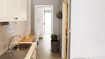 Family Room, Partial Sea View, Ground Floor | Free cots/infant beds, free WiFi, bed sheets