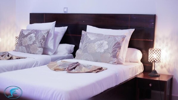 Twin Room, City View | Desk, laptop workspace, blackout drapes, iron/ironing board - HOTEL FREESIA  (Yaoundé)