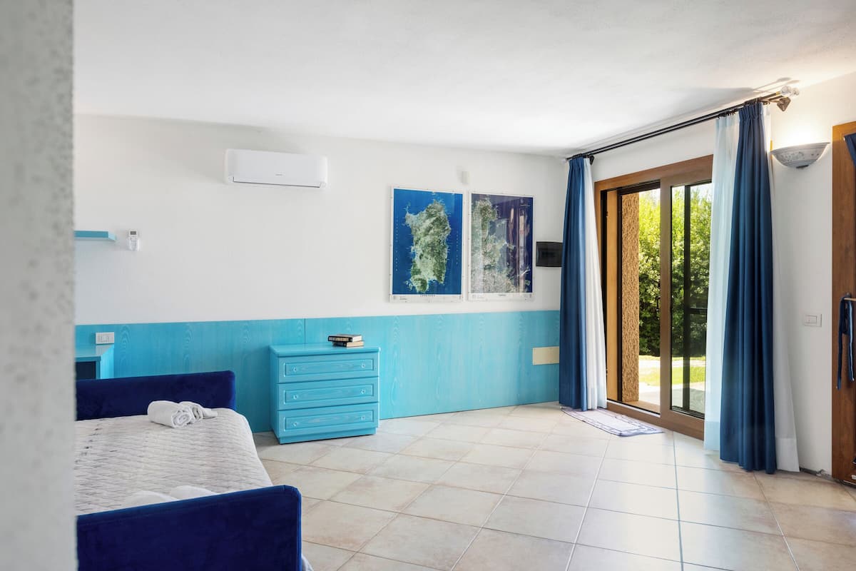 Comfort Room, Pool View | Individually furnished, blackout drapes, iron/ironing board, free WiFi