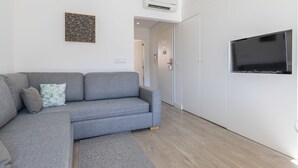 1 soverom, strykejern/-brett, barnesenger (inkludert) og sengetøy