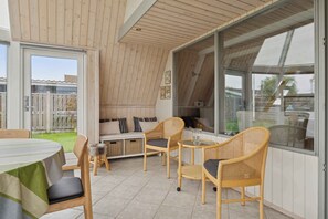 Outdoor dining - Lovely holiday home with sea view (Otterup)
