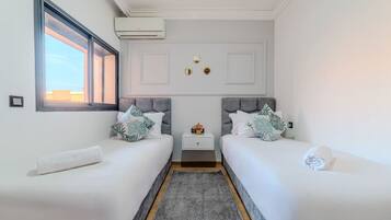 2 bedrooms, desk, iron/ironing board, travel crib