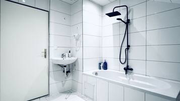 Hair dryer, towels, soap, shampoo