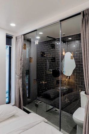 Economy Double Room | Bathroom | Shower, hair dryer, slippers, towels