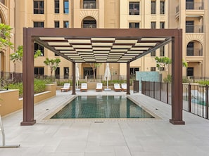 Outdoor pool - Stylish 1BR with Burj Al Arab View (Dubai)