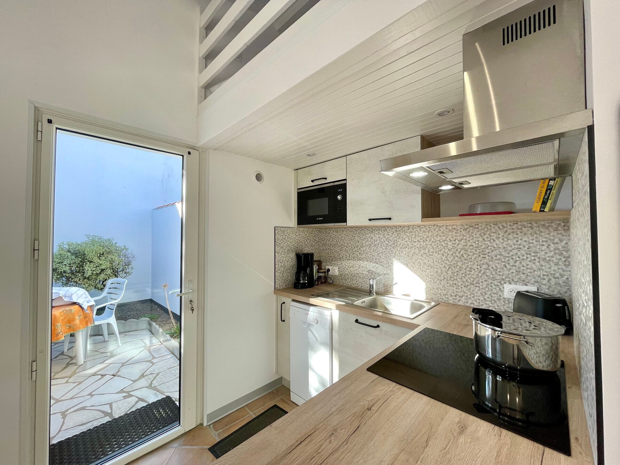 Microwave, stovetop, dishwasher, coffee/tea maker