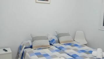 1 slaapkamer, een strijkplank/strijkijzer, wifi, beddengoed