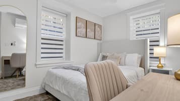 Iron/ironing board, travel crib, WiFi, bed sheets