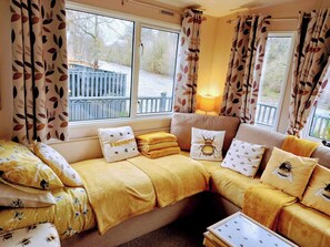 Cabin, 3 Bedrooms, Smoking, Balcony | Living area | Books - The Hive on the River Bank (Hawick)