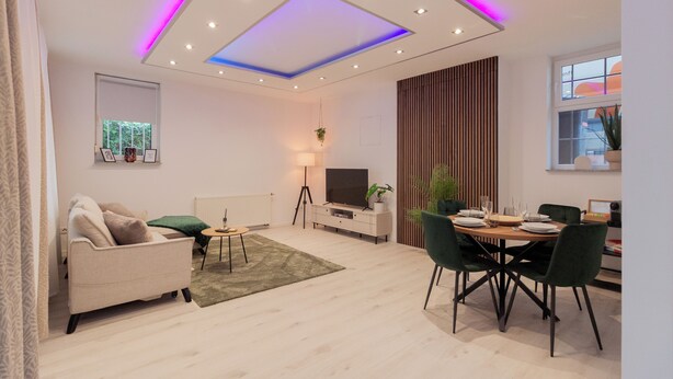 Ein modernes Wohnzimmer mit einer Couch, einem Esstisch mit Stühlen, einem Fernseher und einer Stehlampe.