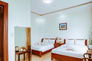 Superior Quadruple Room, City View | Minibar, in-room safe, desk, laptop workspace - An Phu Hotel Nha Trang (Nha Trang)