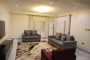 Luxury Apartment, Balcony | Living area - ED - Havilah Suites (Abuja)