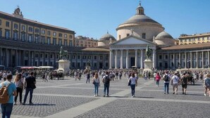 A large open square with historic buildings, including a prominent dome structure. - BLUE DREAM (Napoli)