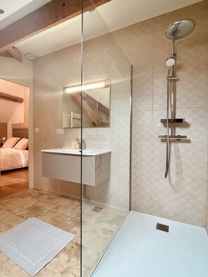 Shower, hair dryer, towels, soap