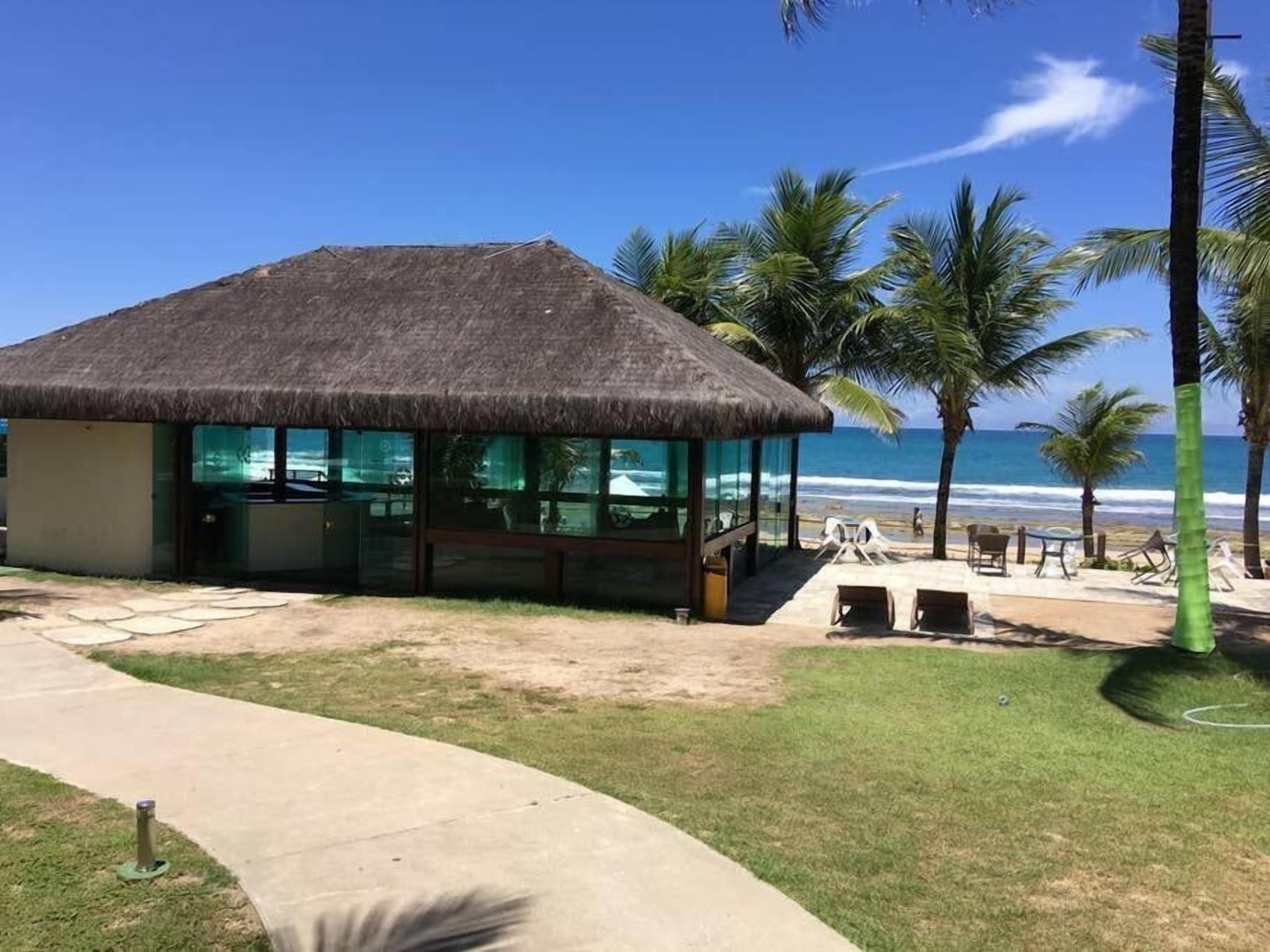 Apartamento | Praia | Na praia, areia branca, guarda-sóis 