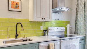 A kitchen with a sink, stove, and dishwasher. - 2 Mi to Lake Elkhorn Park: Family Gem w/ Deck! (Columbia)