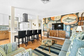 Living area - Sun Baker III East Modern kitchen, authentic island charm. (Homes Beach)