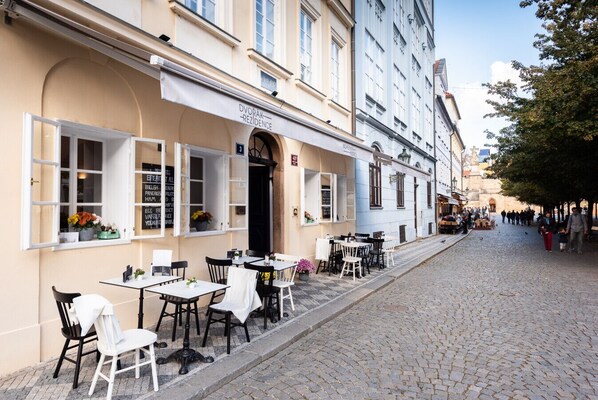 Outdoor dining - Charming Riverside Apartment near Charles Bridge by EasyBNB Premium (Prague)