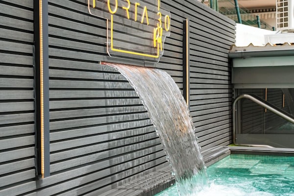 Outdoor pool, open 8:00 AM to 10:00 PM, pool umbrellas, sun loungers