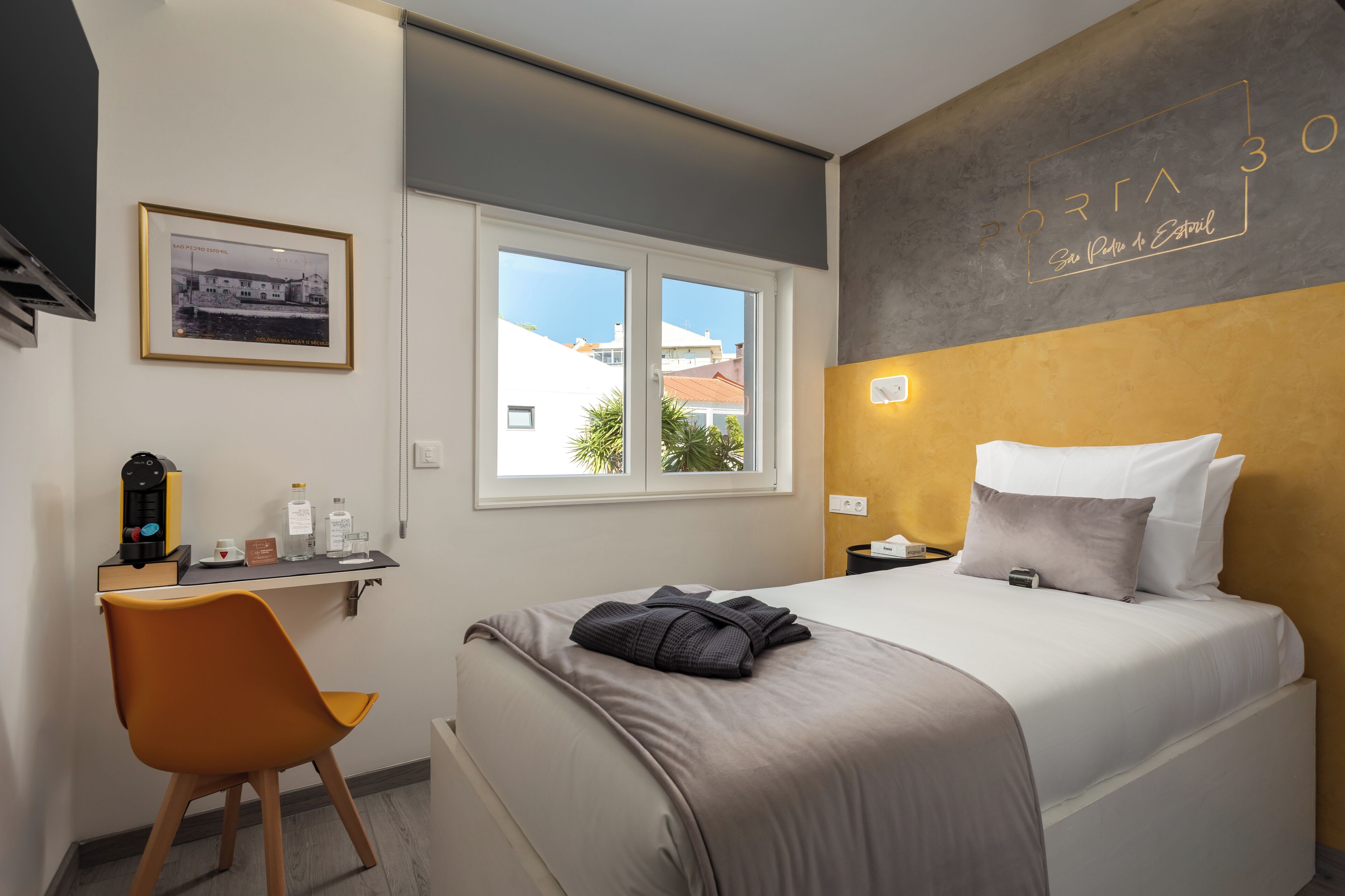 Deluxe Single Room, Pool View | In-room safe, desk, laptop workspace, blackout drapes