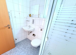 Een douche, een haardroger