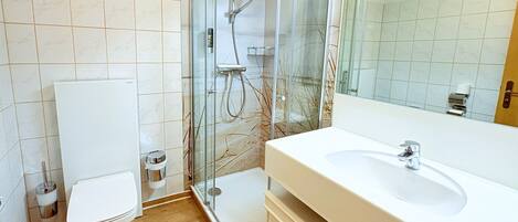 Regadera y secadora de cabello