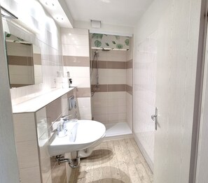 Ducha, secador de pelo