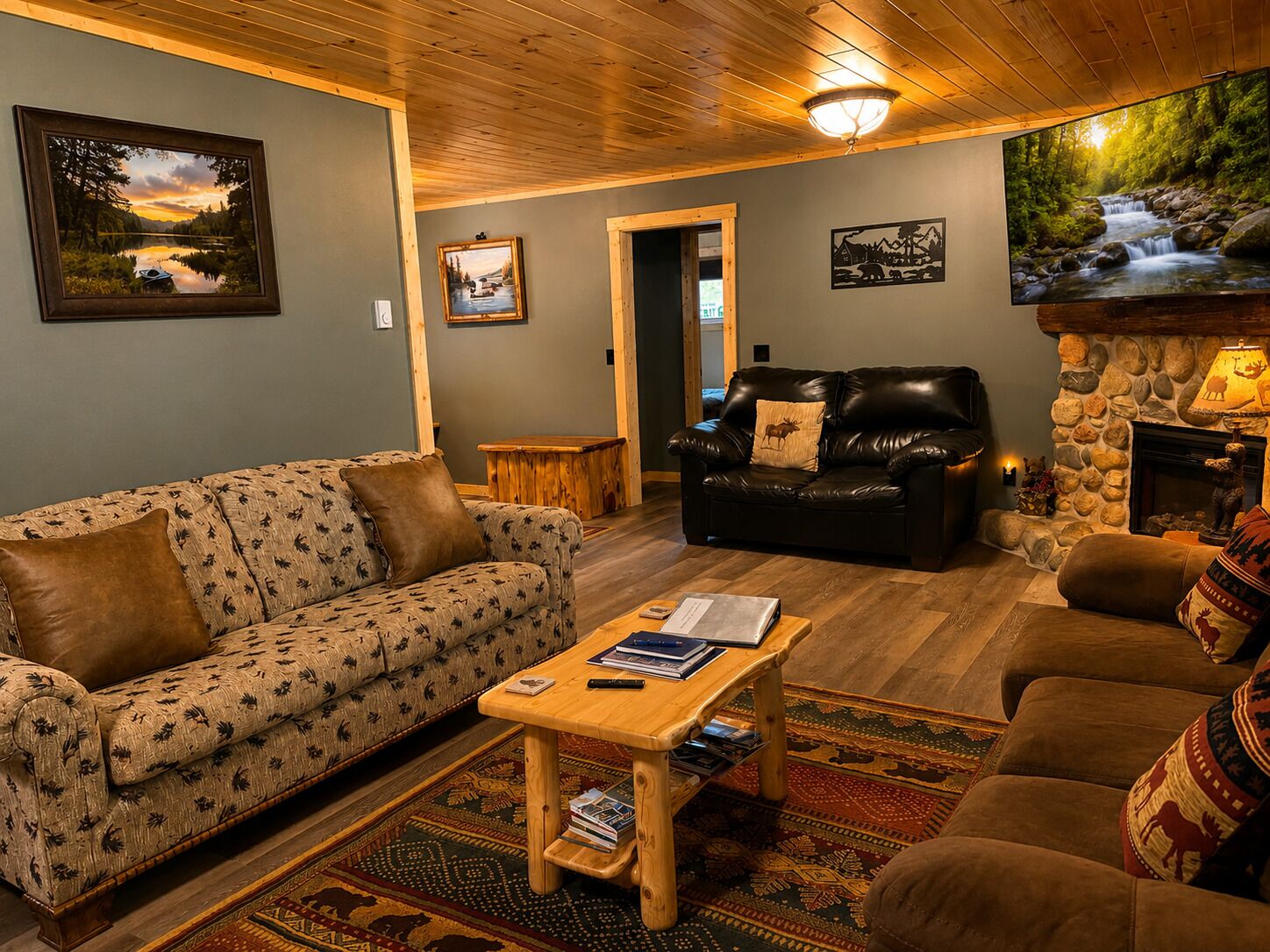 A cozy living room with a sofa, a coffee table, a fireplace, and a television.