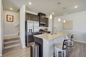 Fridge, microwave, oven, stovetop - NEW Modern Interquest Stay • King Bed • Balcony (Colorado Springs)