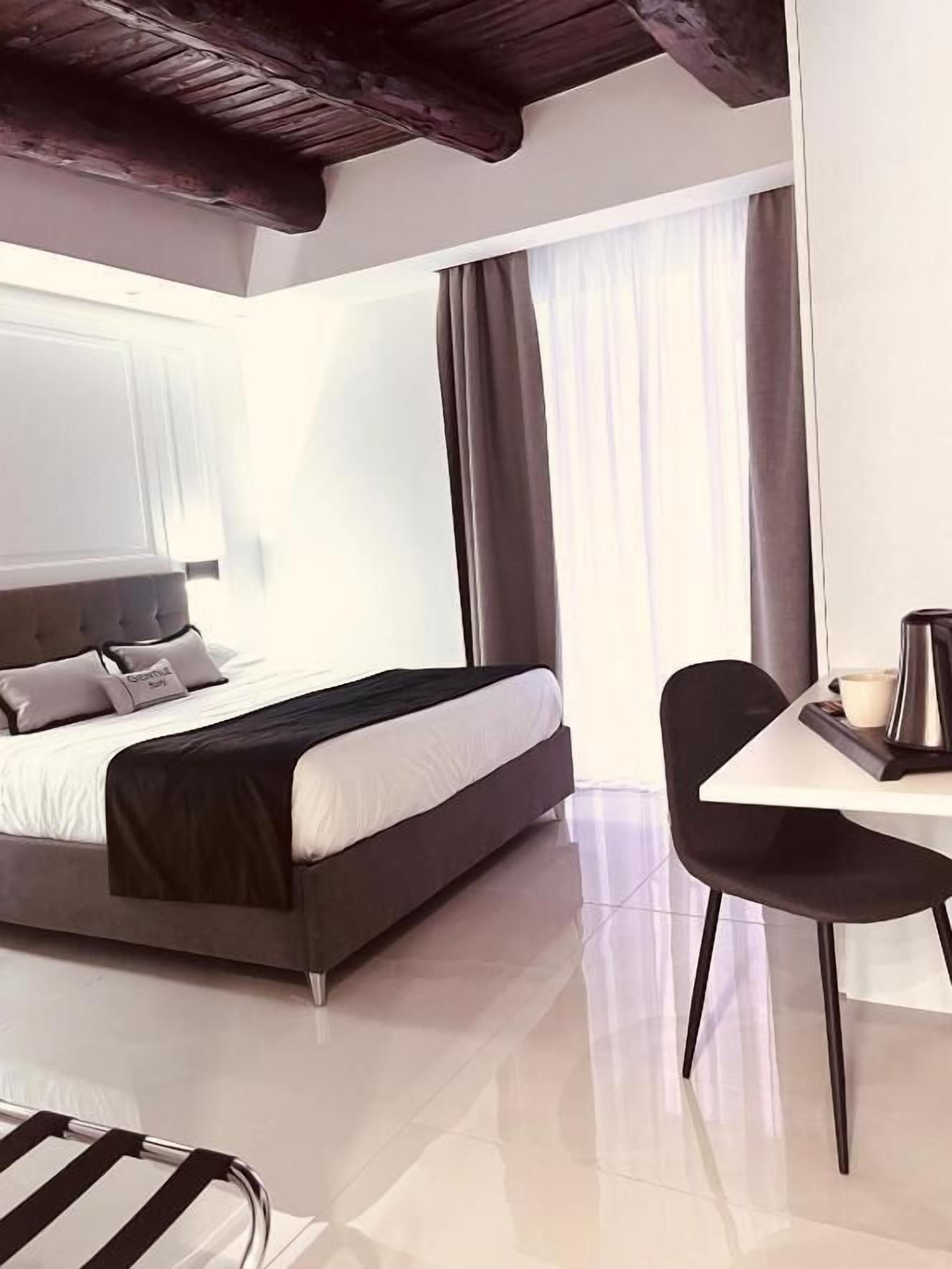 Family Studio Suite, Balcony, Courtyard View | In-room safe, soundproofing, free WiFi